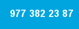 977 382 23 87